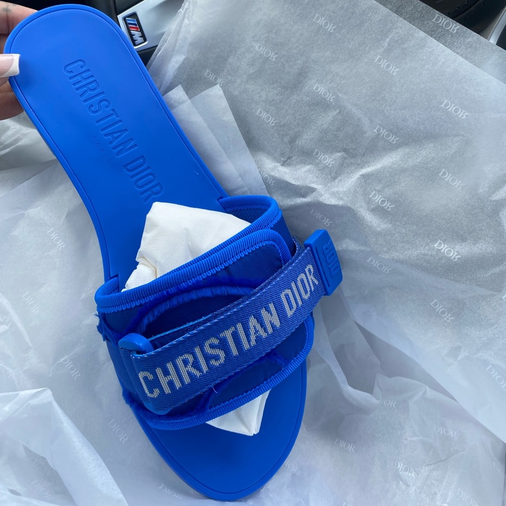 Blue dior slides.
